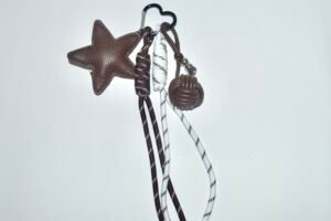 Charm - Estrella Marrón Chocolate